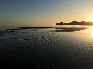 Home. sunset on beach